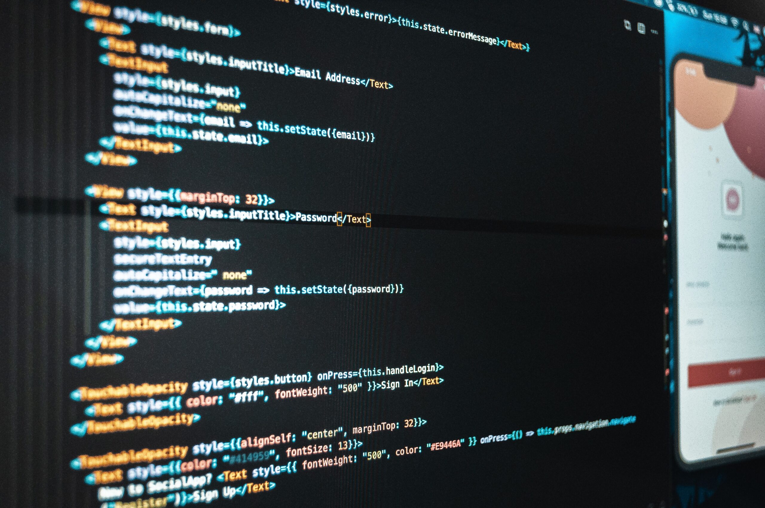 Mobile app code on a computer screen, representing Flutter and native app development